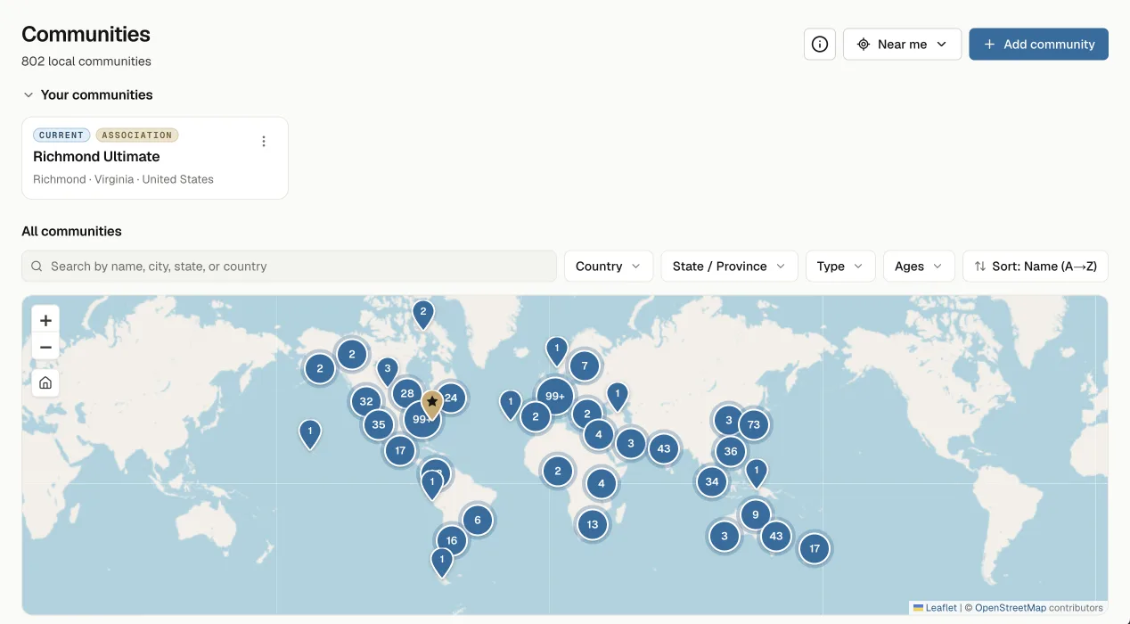 The Communities page: 802 local communities, with the info button, Near me and Add community in the header, a Your communities shelf holding Richmond Ultimate - marked Current and Association - and below it All communities with its search, filters and a world map of community pins